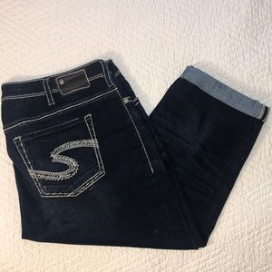 Silver Suki, Cropped, Dark-Wash Jeans with light stitching.